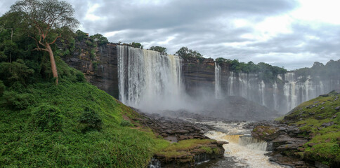 Aerial view of the cascading Kalandula Falls based in Angola. The falls are located in a green...