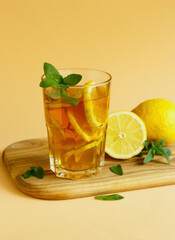 Refreshing Iced Tea Out Of Black Tea, Lemon Slices, Garnished With Fresh Mint Leaves