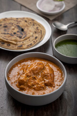 chicken butter masala served with lachha parantha