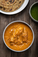 chicken butter masala served with lachha parantha