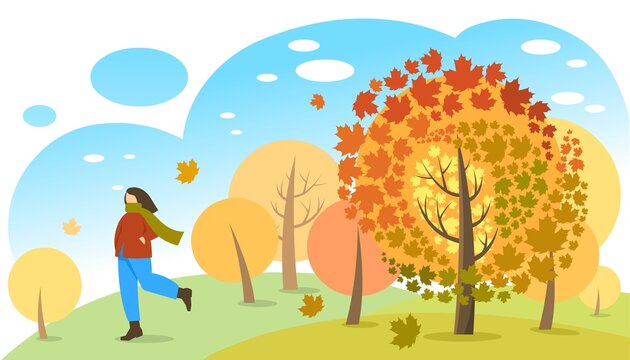 Young woman walking in autumn park, forest. Active recreation in nature. Colorful autumn trees and blue sky. Bright maple and leaves the wind blows. Suitable for banner, web, flyer. 