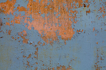 Old grunge rusty iron metal wall blue background