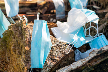 Used face masks in trash. Environmental pollution concept