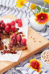 Chickpea Pie Blondie is a healthy dessert made from chickpeas that does not contain flour, sugar or eggs. Vegan dessert. Garnished with fresh raspberries