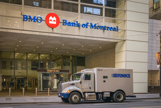 TORONTO, CANADA - MARCH 08, 2020: Brinks armoured security truck at Bank of Montreal on Bay Street in Downtown