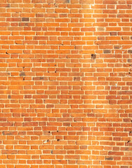 Naklejka na ściany i meble Old red brick wall as an abstract background.