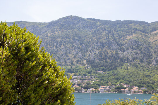 Beautiful sea and mountain views under the bright blue sky. View to the Kotor bay Montenegro to Adriatic sea.