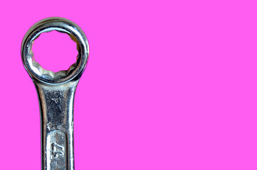 Wrenches on a pink background. Wrench isolated on a pink background.