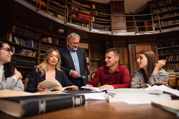 Professor gives a lecture to his students