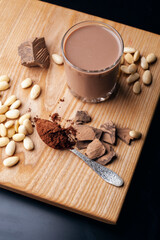 Almond milk with cocoa ingredients and honey for a healthy breakfast.