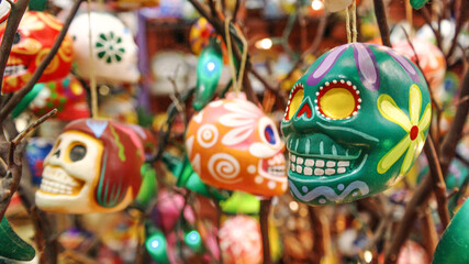 Fototapeta premium Various and colorful skull models that symbolize Mexico