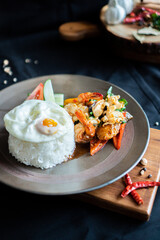 Pad Krapow seafood with fried egg , Thai basil seafood - Asian food style