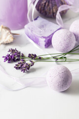 Fototapeta na wymiar Aroma bath ball bomb with lavender extract for relaxation on marble background