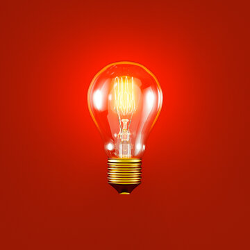 glowing classic light bulb with filament on red background, web banner or template, 3d rendering