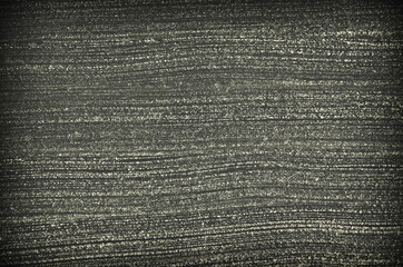 white, horizontal stripes of sand on a black background.
basis for text and drawing