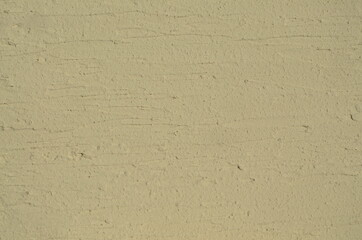 painted wall.
 decorative plaster, beige horizontal stripes. for interiors and design.
Background for presentation and text.
