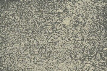 a lot of large white chips on a dark background.
abstract black and white drawing.