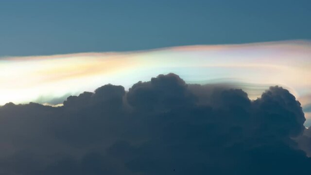 Beautiful Time-lapse of nature Iridescent Pileus Cloud on sky