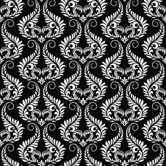 Wallpaper in Baroque style, damask. A seamless vector background. Black and white texture Floral ornament.