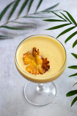Pineapple cocktail with crispy pineapple garnish