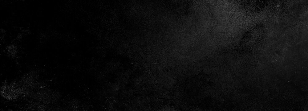 Scary dark wall, low light black concrete cement texture for background