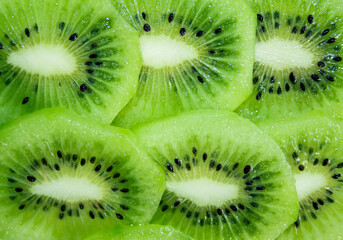 Fresh juicy kiwi slices closeup.