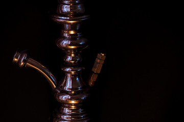 Hookah shaft close-up on a black background. 