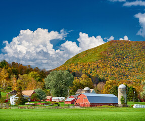 Farm with red barn and silos in Vermont