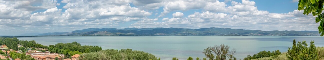 Fototapeta na wymiar Stunning panoramic view of Lake Trasimeno, from Castiglione del Lago, Umbria, Italy