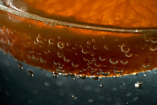 Bubbling gin and tonic with orange