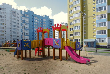 Fototapeta na wymiar children's playground in the courtyard of a new building