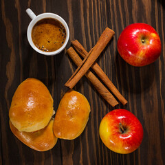Fresh pies with apples and cinnamon and coffee