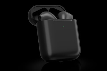 Wireless bluetooth headphones in black case isolated on black background