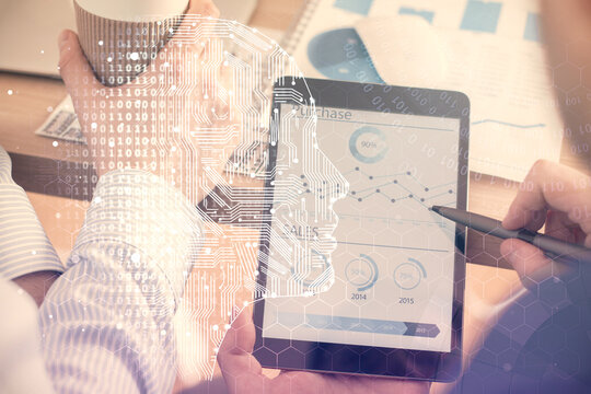 Double exposure of man's hand holding and using a digital device and brain hologram drawing. Data concept.