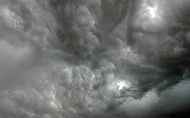 Storm clouds circulate in front of incoming strong thunderstorm squall line,