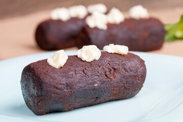 cake is covered with a layer of powdered sugar with cocoa