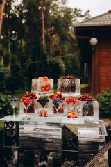 setting the wedding table with fruit in the garden