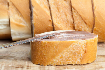 sliced white bread with sweet chocolate butter spread