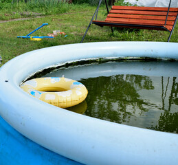 inflatable pool, lifebuoy on the water, close-up