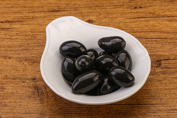 Pickled black olives in the bowl
