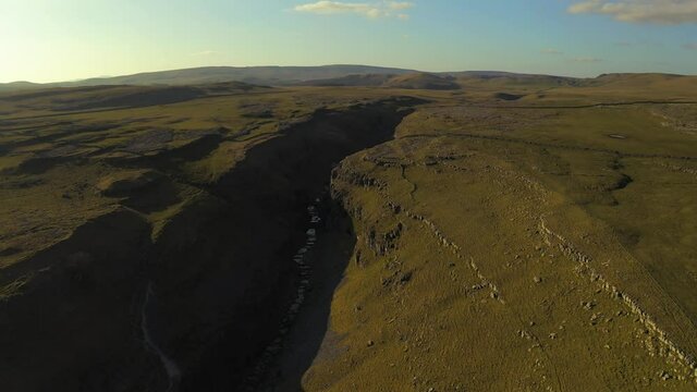 gordale scar near malham at yorkshire dales national park aerial drone shot