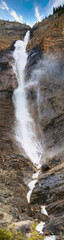 It Tumbled Down In Grace: a vertical panorama of a tall mountain waterfall. 