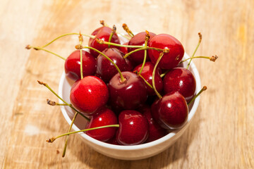delicious sweet cherries covered with water droplets