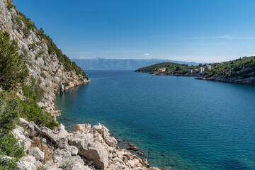 Fototapeta na wymiar Beautiful view of the rocky shores flowing straight into the Adriatic Sea around the island of Hvar