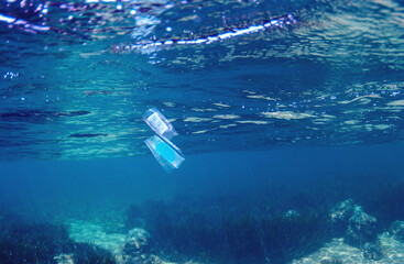 Underwater photograph of plastic wrap in the sea.