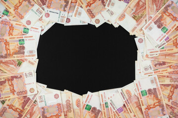Russian currency on a black background