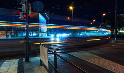 Naklejka premium Munich Karlsplatz at night with train and lights