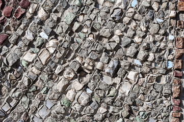 An Old Artistic Grunge Texture. Background of Wall of granite multicolored stones and concrete