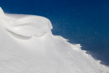 Fototapeta na wymiar deep snow drifts after the last snowfall