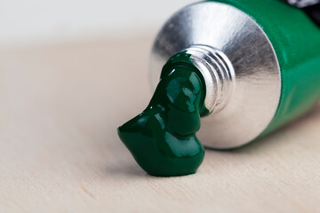 tubes of green oil paint